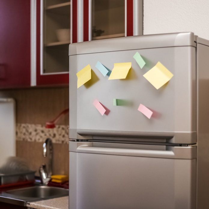 Empty paper sheet on refrigerator door with magnetic clip paper note for add text message.; Shutterstock ID 716205340; Job (TFH, TOH, RD, BNB, CWM, CM): TOH