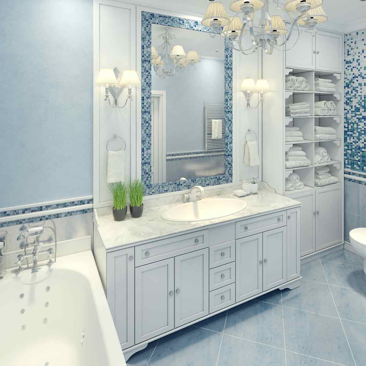 Bright-art-deco-bathroom-interior-The-spacious-bathroom-with-white-furniture-and-fragments-of-mosaic-wall