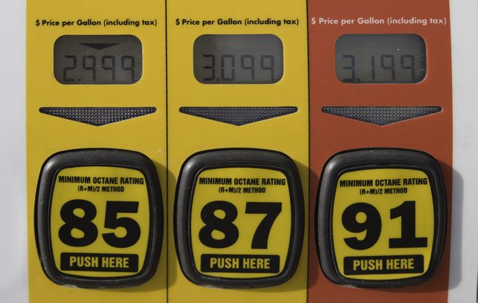 Price display on three different levels of gasoline in US dollars. Price gouging?