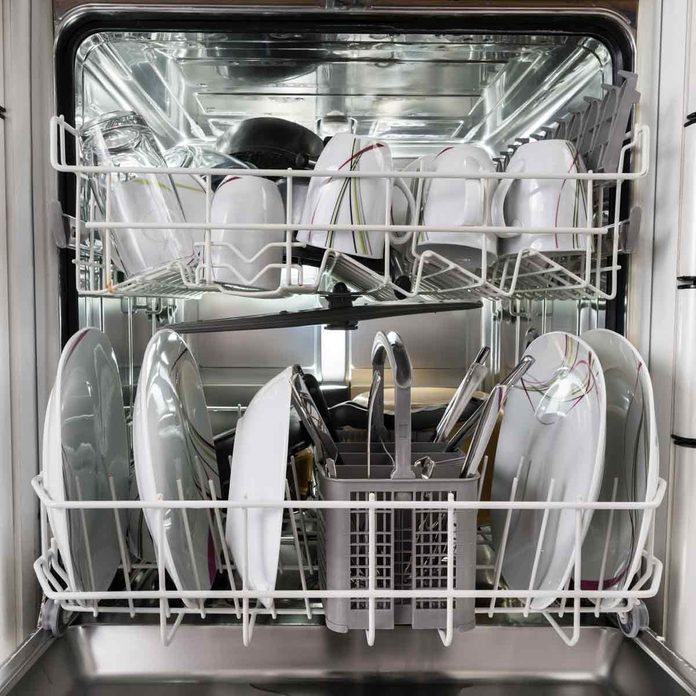 Photo-Of-Utensils-Arranged-In-Dishwasher-In-Kitchen