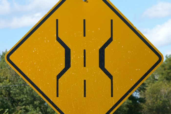 Narrow bridge sign on country road