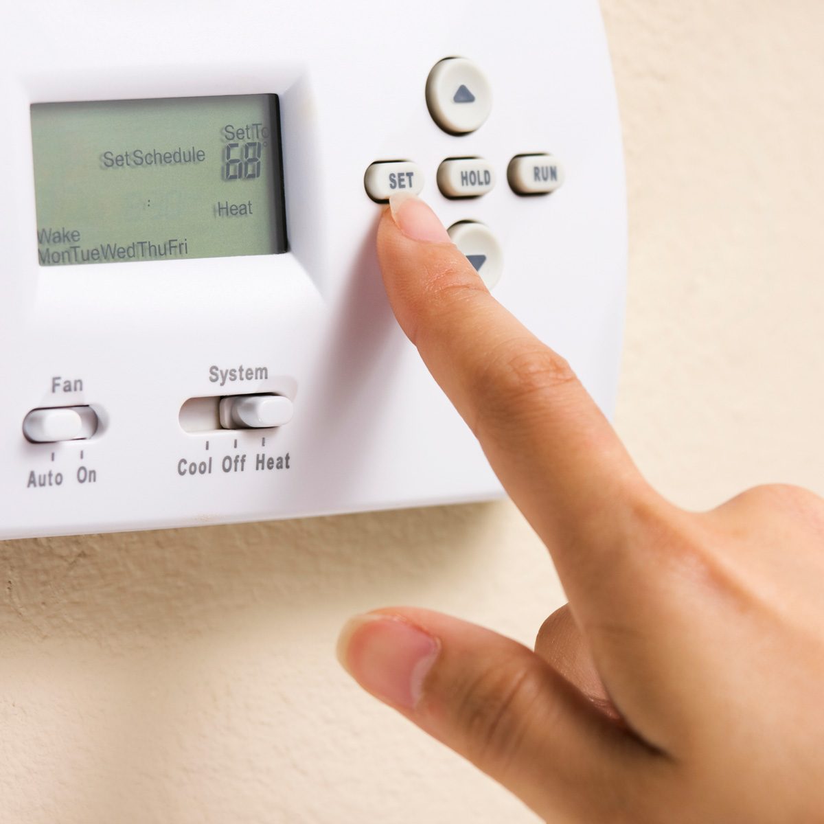 programmable thermostat Setting thermostat