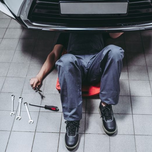 Man fixing a seized engine