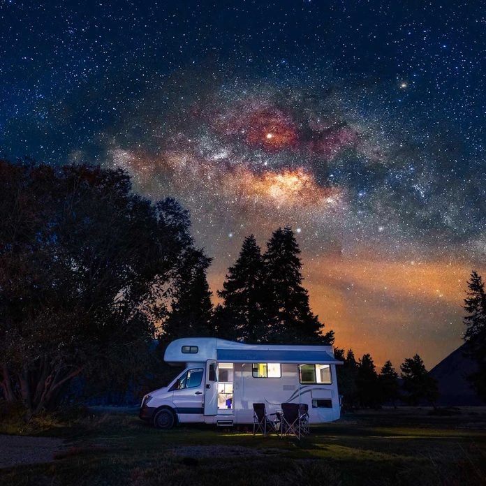 Camper under the starry sky