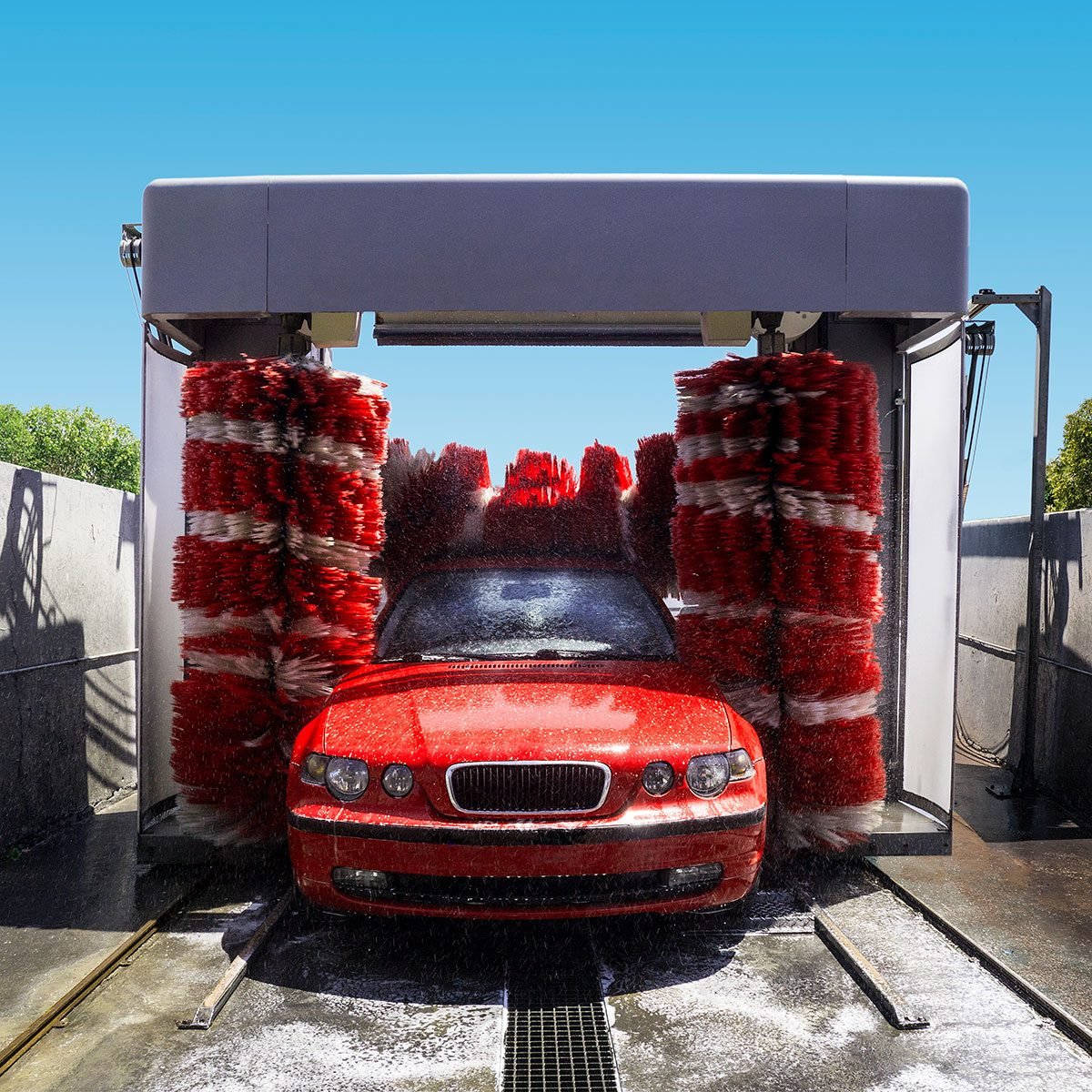 Premium Photo  Car wash selfservice strong stream of water washes the soap  suds out of the car