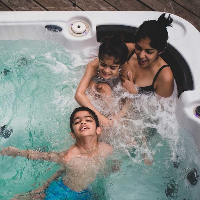 Family enjoying a hot tub