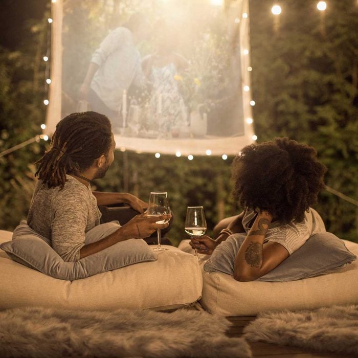 Couple watching an outdoor projector