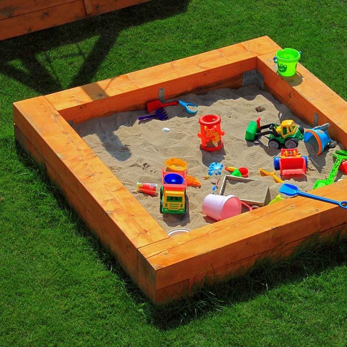 Sandbox with toys