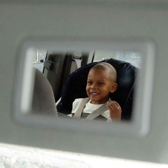 Kid In Car Mirror