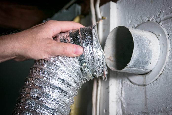 Flexible aluminum dryer vent hose, removed for cleaning/repair/maintenance