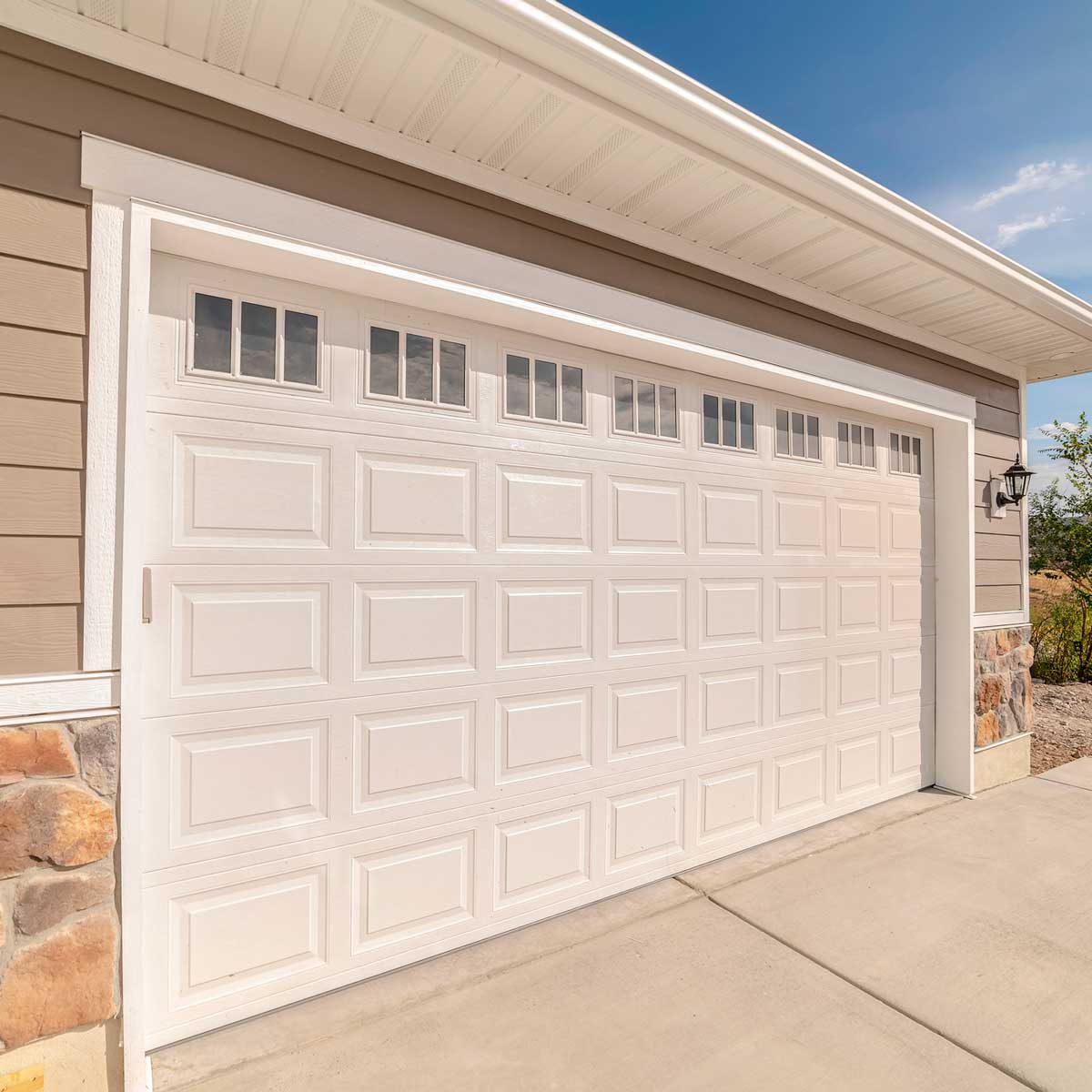 Converting A Garage Into Living Space, How Much Would It Cost To Move A Garage Door