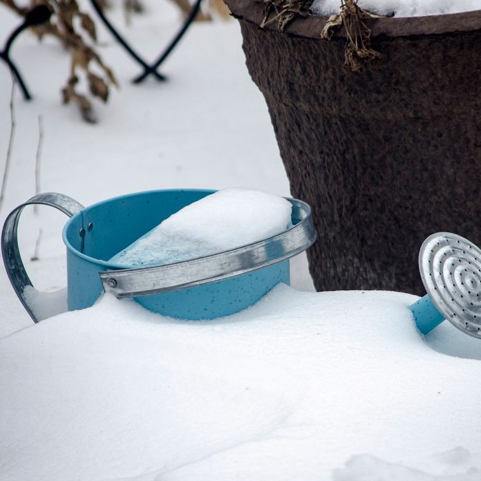 Snowy watering can