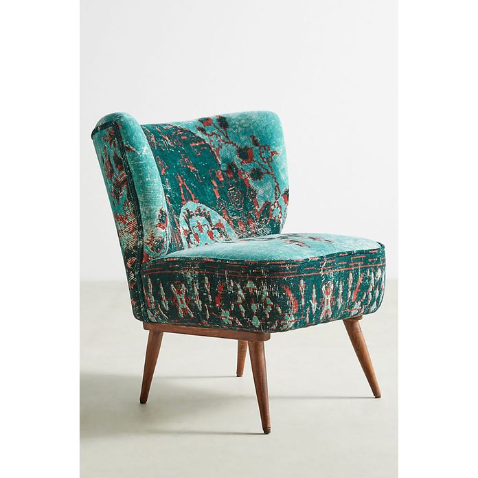 Blue-green chair with red spots