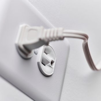 Close Up Of White Plug In Outlet