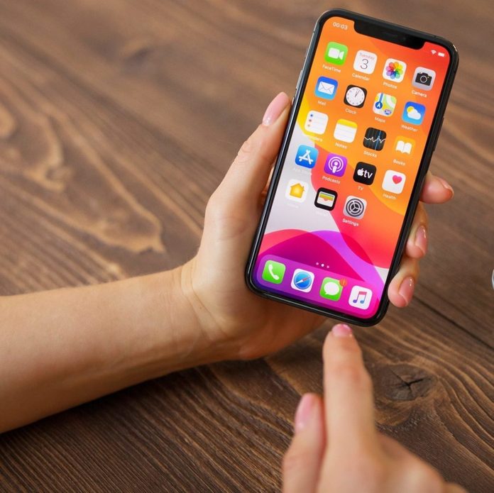 Person using Apple iPhone 11 Pro.