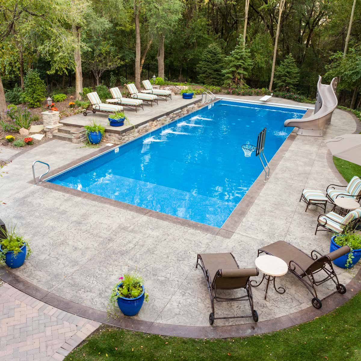 Backyard Swimming Pool water features Gettyimages 155377305 Bball Pool