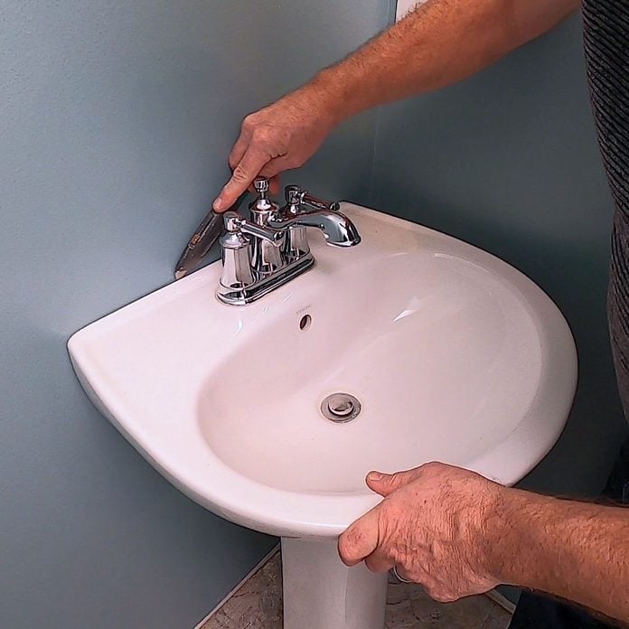 How To Install A New Bathroom Vanity And Sink Family Handyman - How To Secure Bathroom Sink