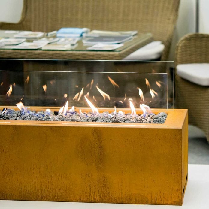 Ethanol Fireplace On Patio Gettyimages 1044391690