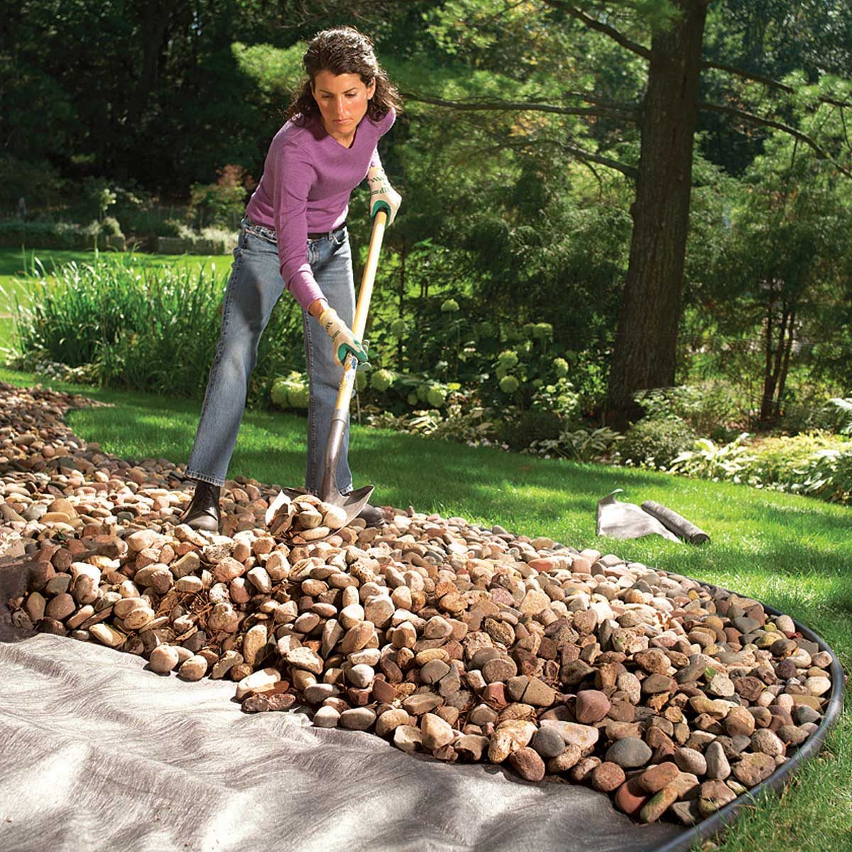 Shoveling stone mulch