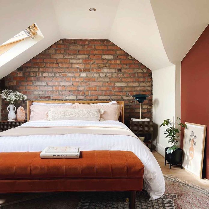 attic bedroom brick wall