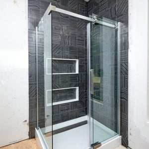 Glass shower surround