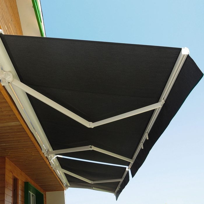 Retractable Roof System, Patio Awning For Sunshade Of A Modern Wooden House.