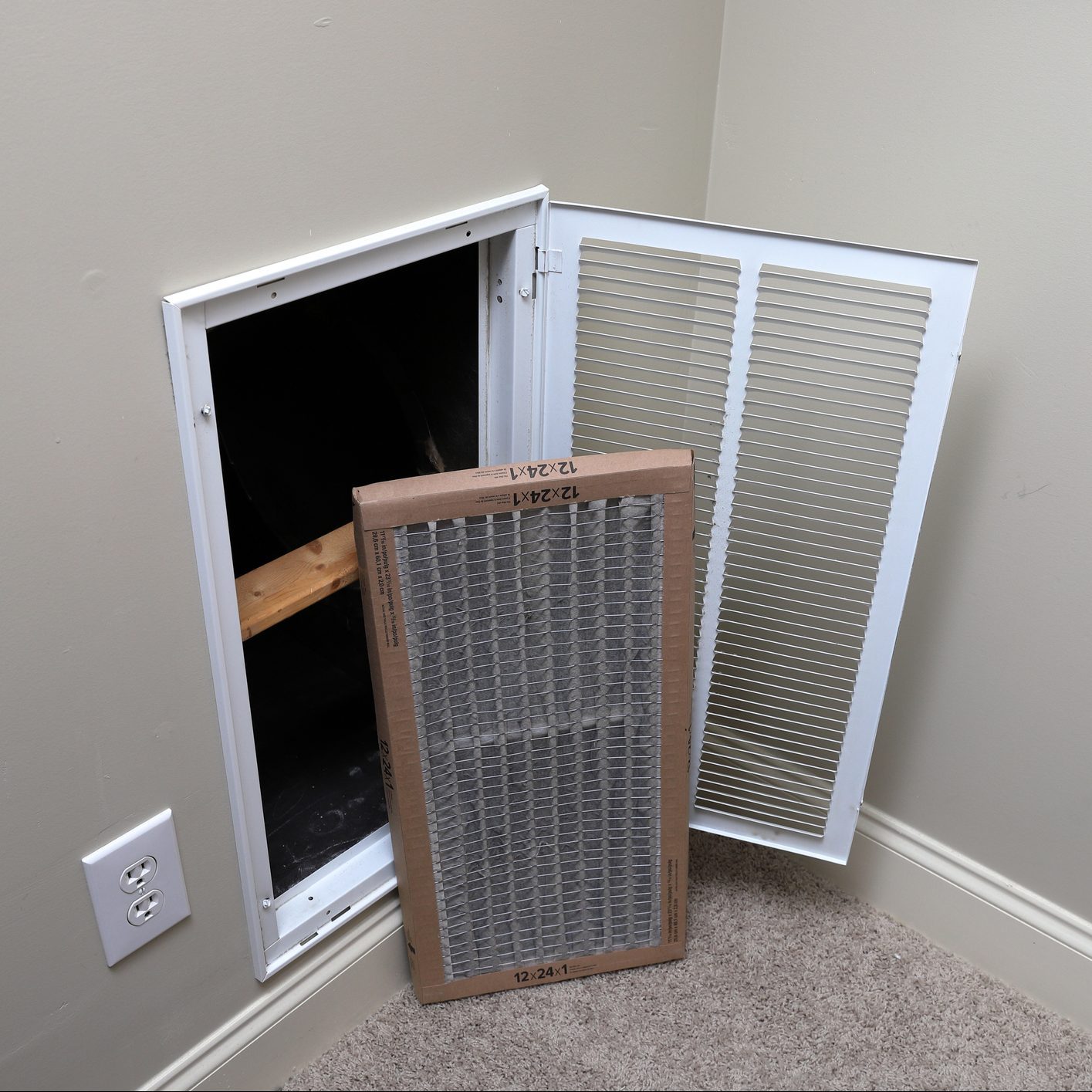 Replacing Dirty Air Filter For Air Conditioner System Maintenance