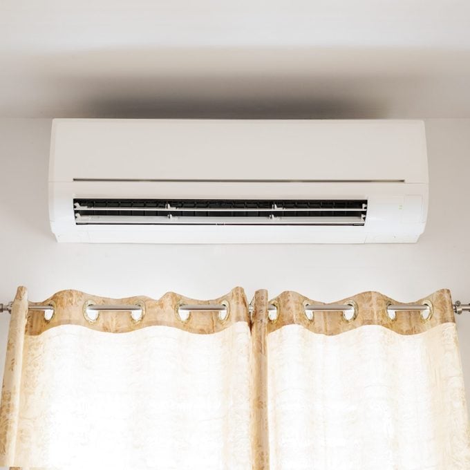 wall mounted Air conditioning above window in a house