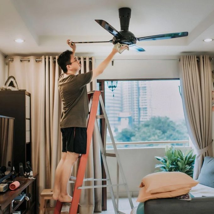 Cleaning Ceiling Fan Gettyimages 1219562449