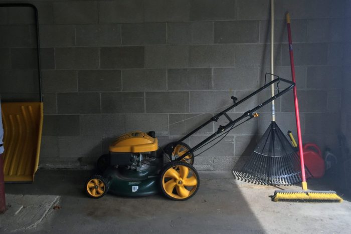 Lawn mower and other tools in the garage