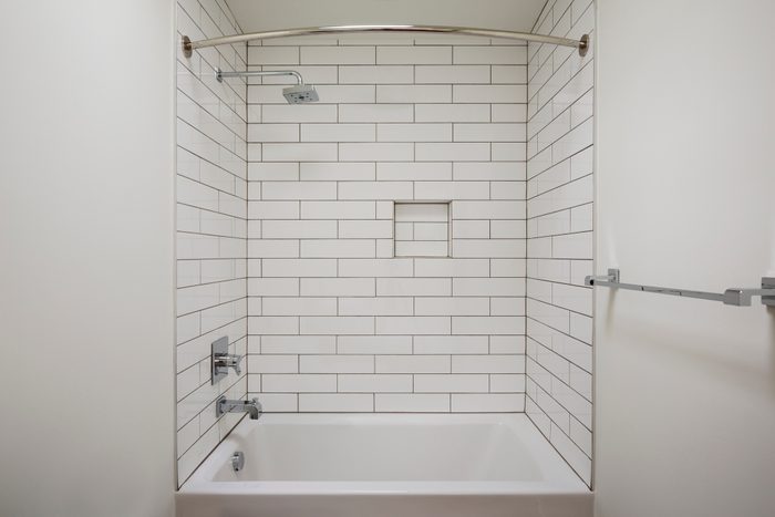 alcove or recessed bathtub in bathroom