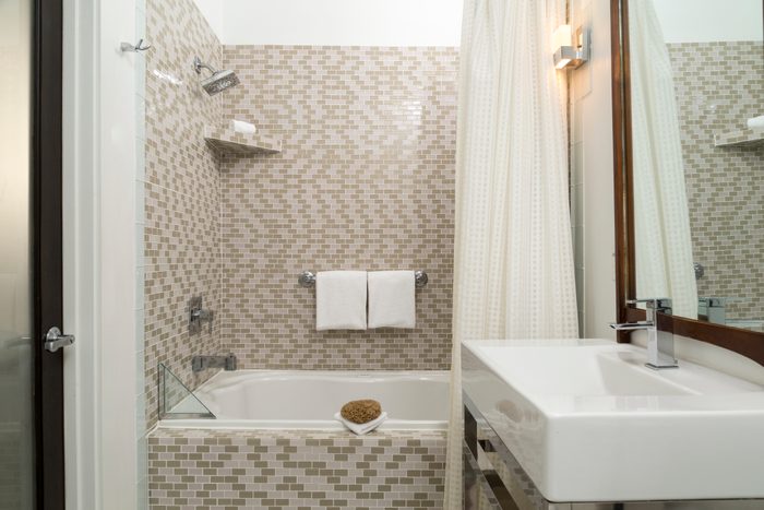 Modern Tiled Bathroom with bath tub and shower combo