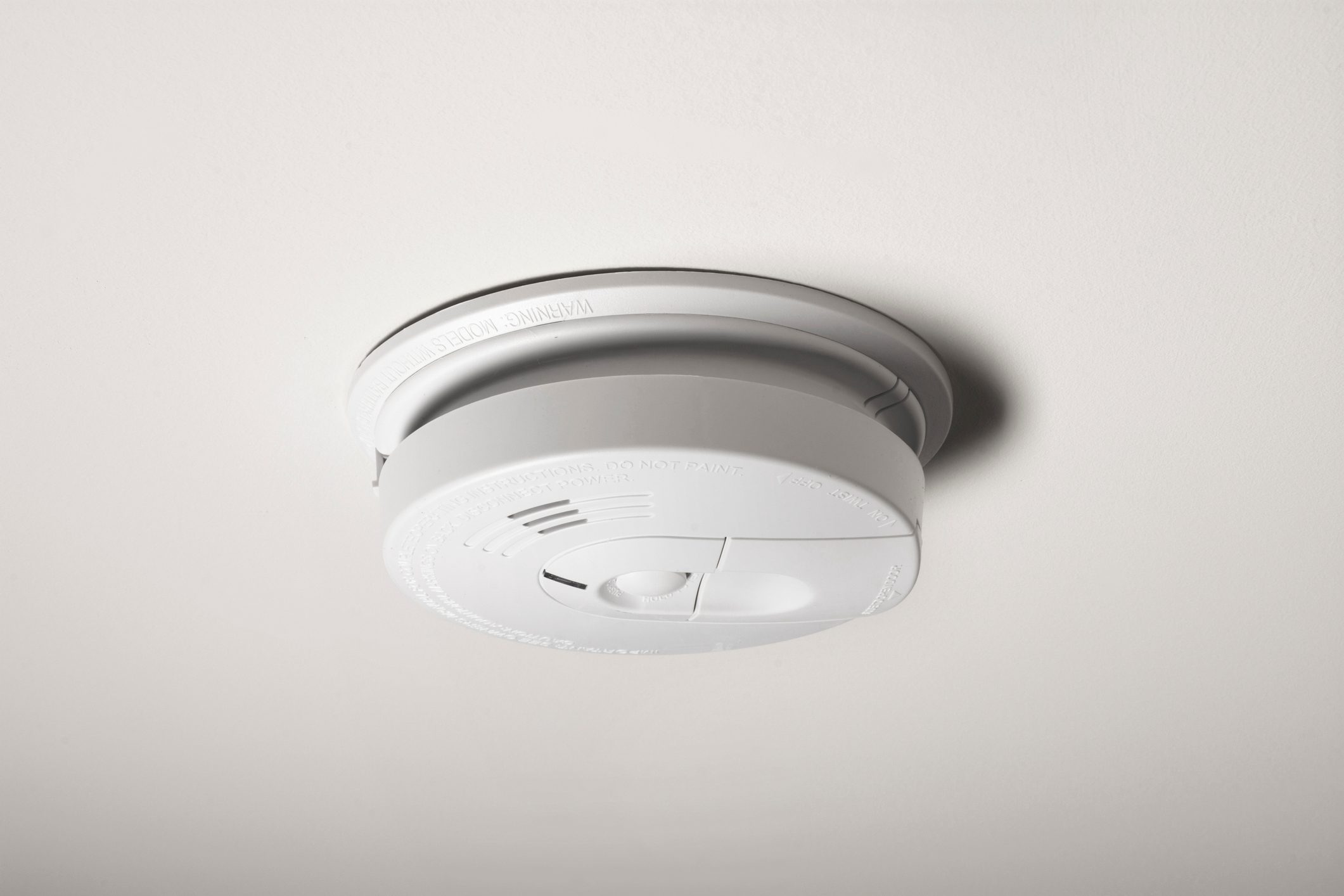 Smoke Detector on the ceiling inside a home