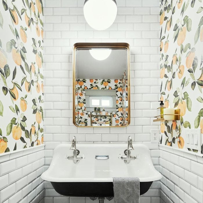 Subway Tile with Wallpaper in bathroom