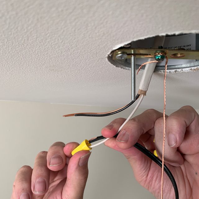 Connect the electrical wire to the light