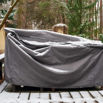 Patio Furniture Covered on a deck in winter