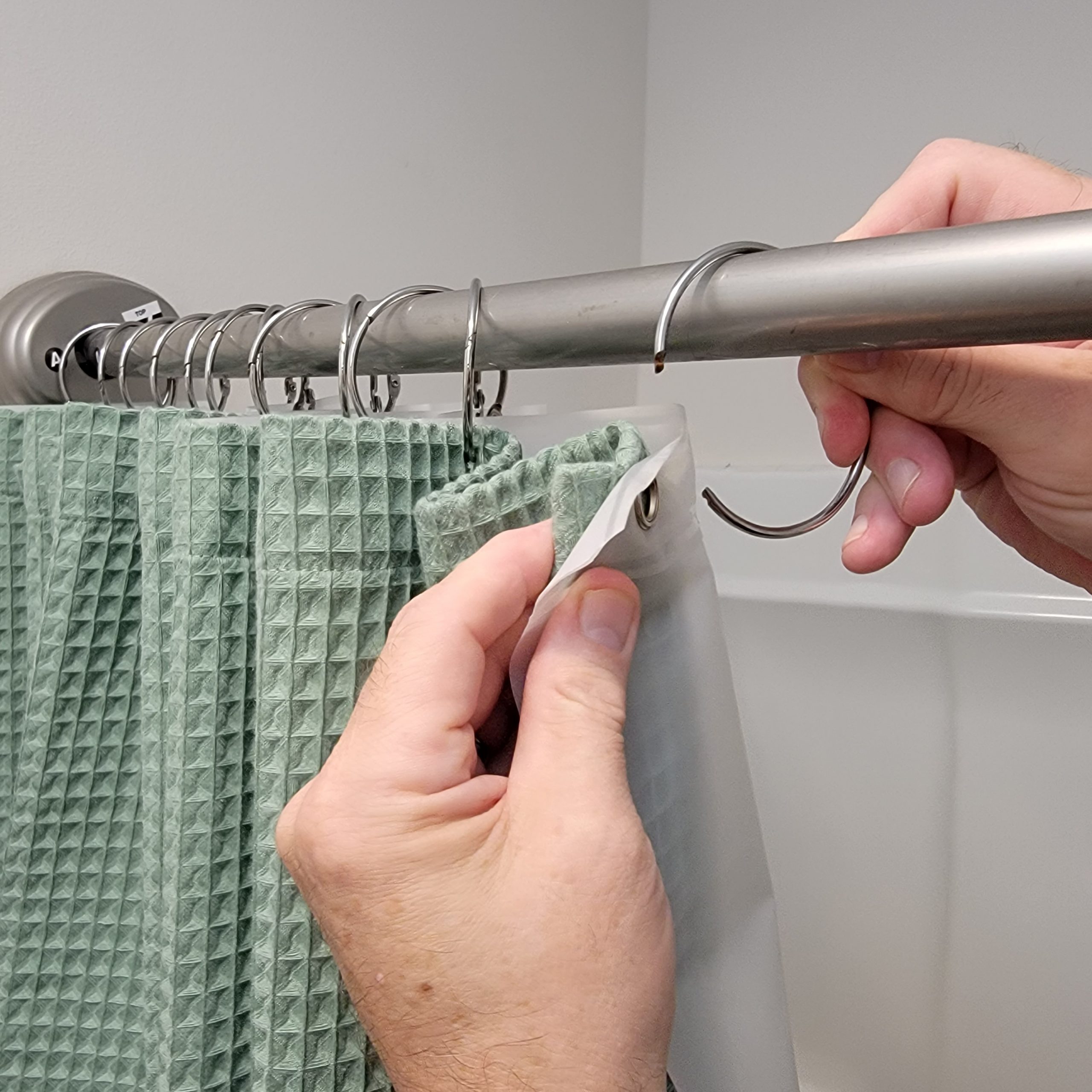 removing the shower curtain