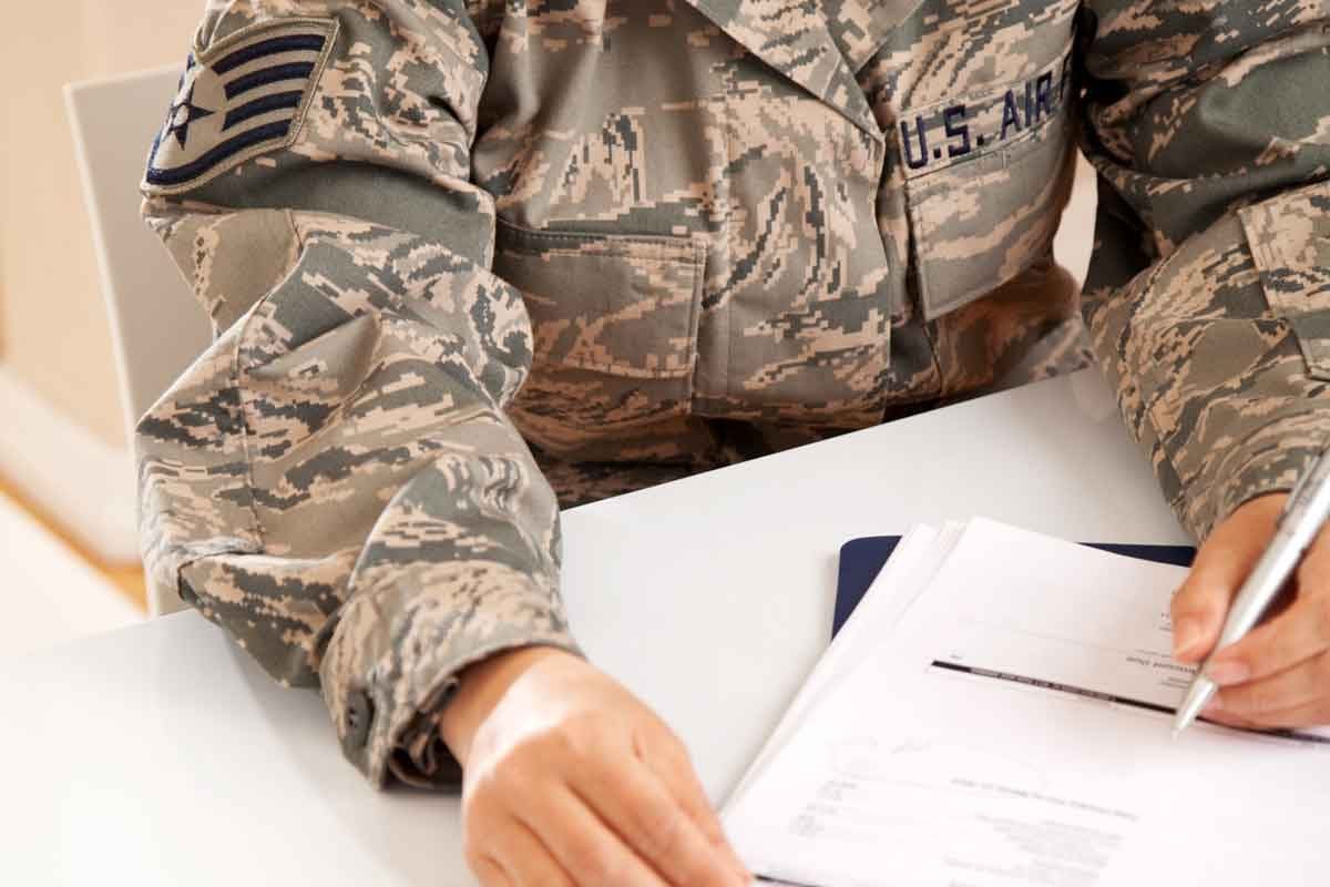 Signing Paperwork in an Army Uniform