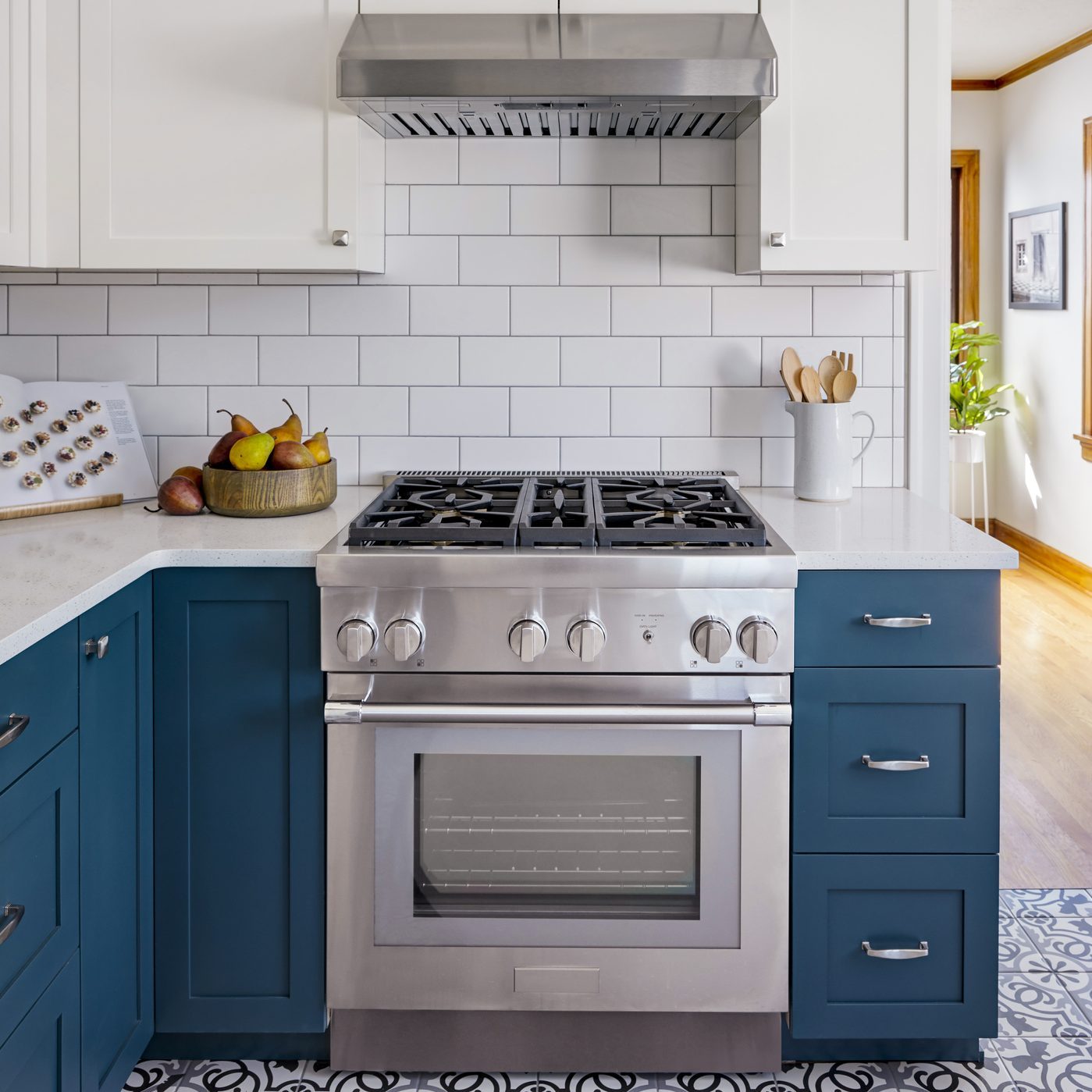 View of a gas stove in a cozy kitchen