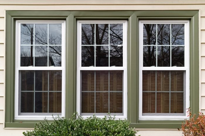 exterior of home windows with green trim