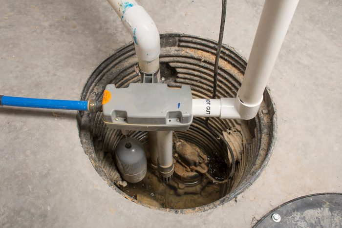 Sump Pump being installed in a home