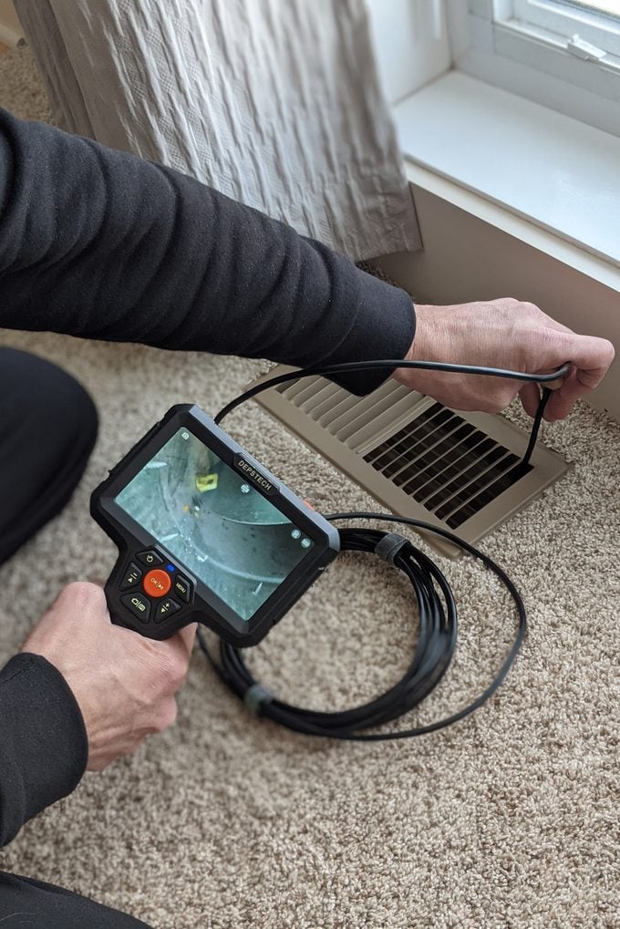 Inspecting an HVAC register with the Depstech DS500 endoscope
