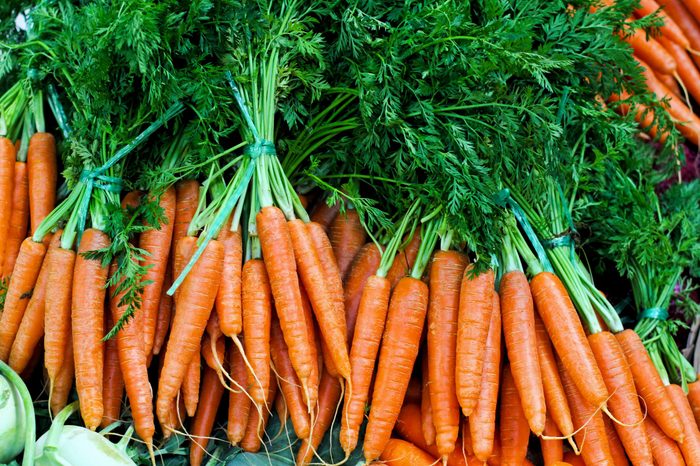 Bunch of organic carrots at the market.