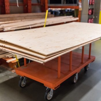Plywood on a cart in a home improvement hardware store