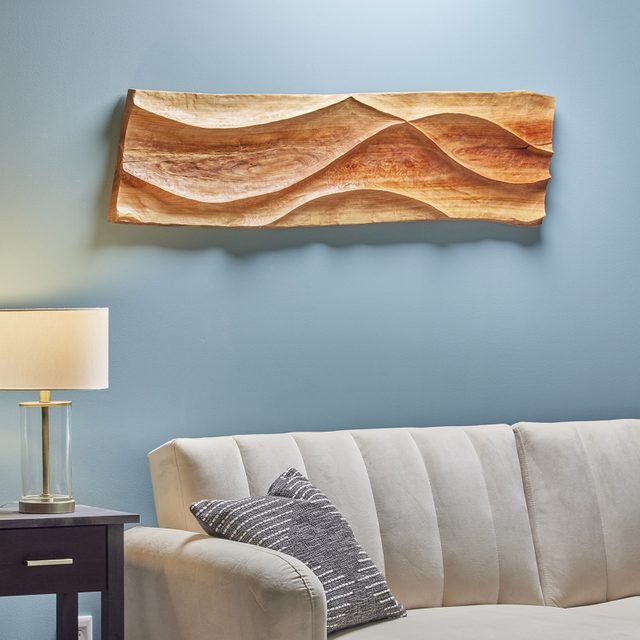 Diy Wood Carving Wall Art hanging in a living room