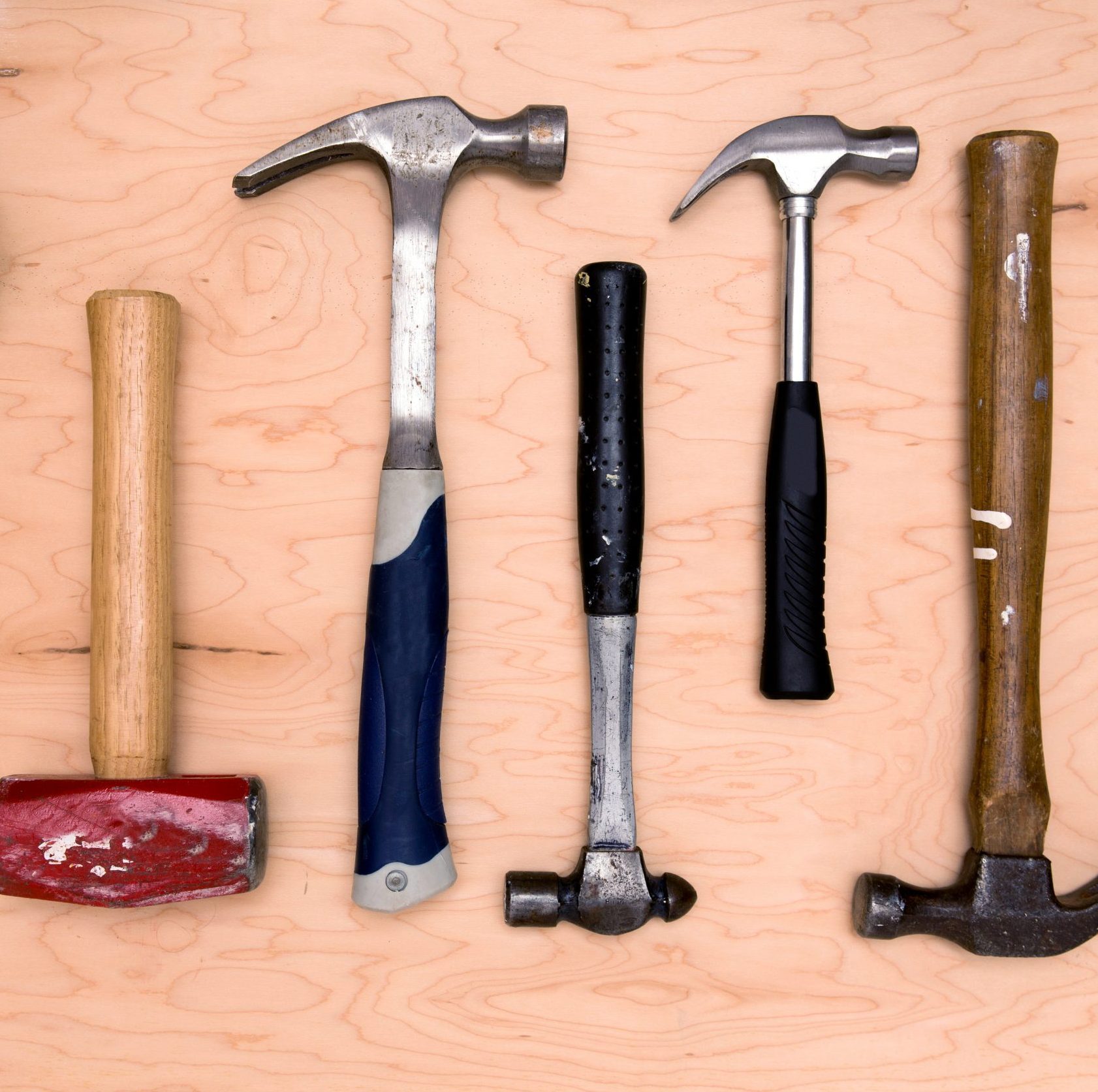 Hammer Assortment on a wood background