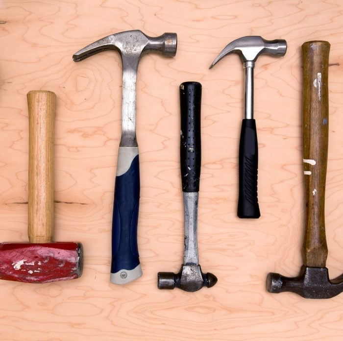 Hammer Assortment on a wood background