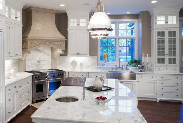 Luxurious white marble residential kitchen.