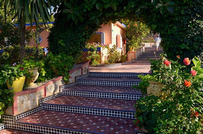 Tiled steps and tropical gardens at Hippocampe resort Oualidia Morocco
