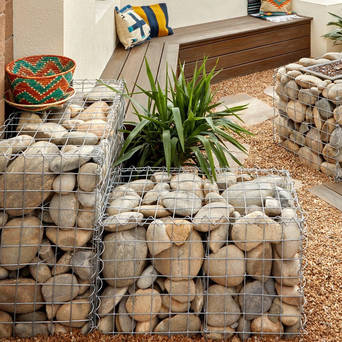 Upgrade Your Backyard with Gabion and Stucco Walls